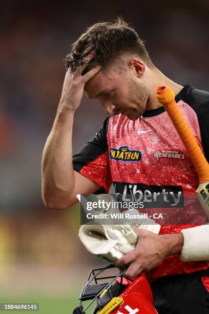 Joe Clarke of the Renegades leaves the field after being dismissed by Aaron Hardie of the Scorchers during the BBL match between Perth Scorchers and...