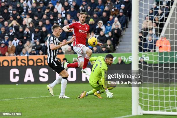 Chris Wood of Nottingham Forest scores their sides second goal past Martin Dubravka of Newcastle United during the Premier League match between...