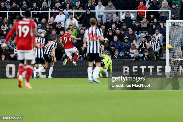 Chris Wood of Nottingham Forest scores their sides second goal past Martin Dubravka of Newcastle United during the Premier League match between...