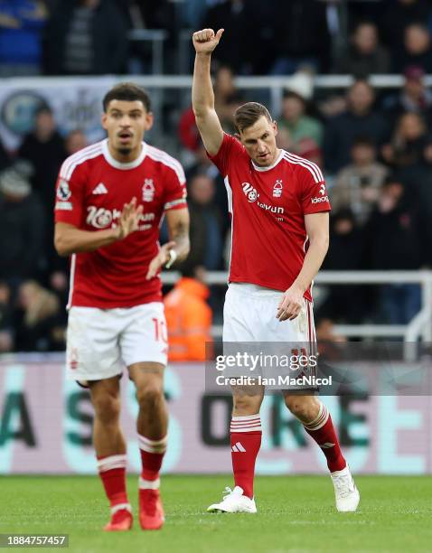 Chris Wood of Nottingham Forest celebrates after scoring their sides third goal during the Premier League match between Newcastle United and...