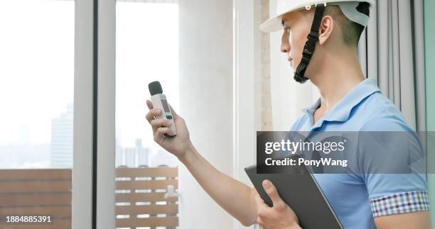 man use sound level meter - spirit level stock pictures, royalty-free photos & images