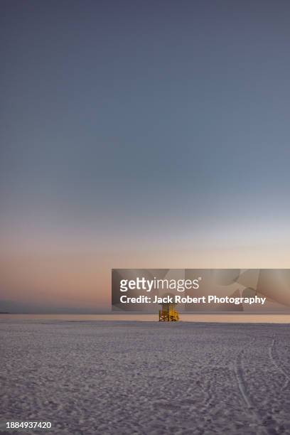 twilight solitude at siesta key beach - siesta key stockfoto's en -beelden