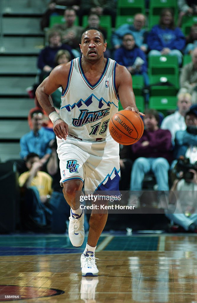Mark Jackson Racing Mark Jackson of the Utah Jazz drives against the Denver Nuggets... News ...