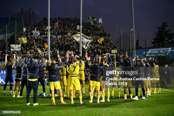 Parma Calcio team celebrate with fans after Serie B match between Brescia and Parma at Stadio Mario Rigamonti on December 26, 2023 in Brescia, Italy.