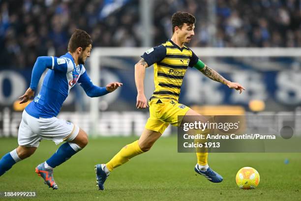 Enrico Del Prato runs with the ball during Serie B match between Brescia and Parma at Stadio Mario Rigamonti on December 26, 2023 in Brescia, Italy.