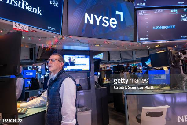 Traders work on the floor of the New York Stock Exchange on the first day back since the Christmas holiday on December 26, 2023 in New York City....