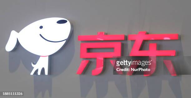 The logo of JD.com is being displayed at the Appliance &amp; Electronics World Expo in Shanghai, China, on March 23, 2021.