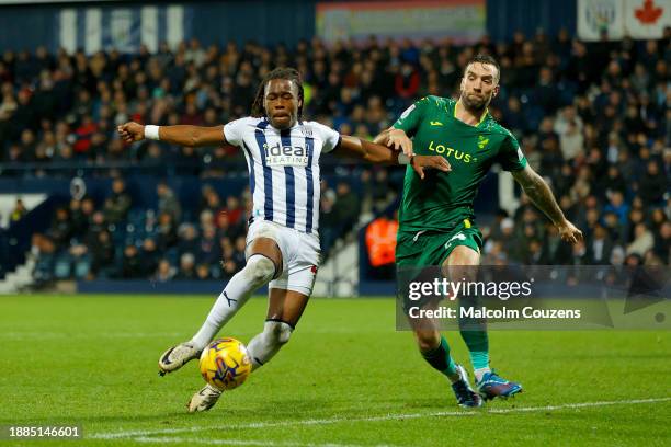 Brandon Thomas-Asante of West Bromwich Albion competes with Shane Duffy of Norwich during the Sky Bet Championship match between West Bromwich Albion...