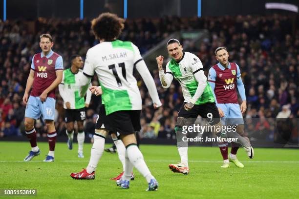 Darwin Nunez of Liverpool celebrates after scoring their team's first goal during the Premier League match between Burnley FC and Liverpool FC at...