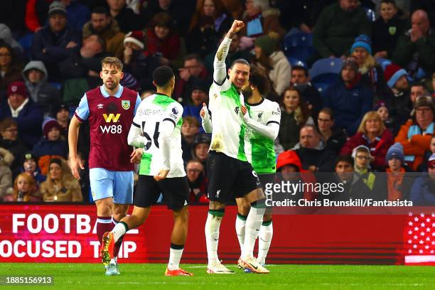 Darwin Nunez of Liverpool celebrates scoring the opening goal during the Premier League match between Burnley FC and Liverpool FC at Turf Moor on...