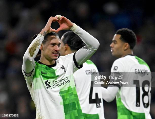 Darwin Nunez of Liverpool celebrates after scoring the opening goal during the Premier League match between Burnley FC and Liverpool FC at Turf Moor...