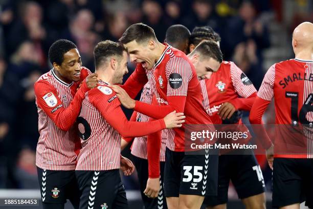 Jan Bednarek of Southampton congratulates team mate Ryan Fraser during the Sky Bet Championship match between Southampton FC and Swansea City at St....