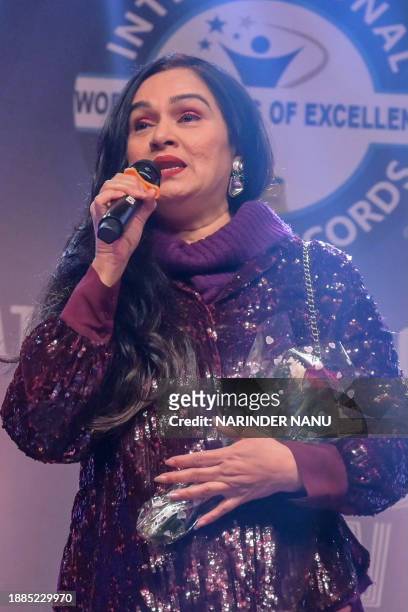 Bollywood actress Padmini Kolhapure speaks during an event in Amritsar on December 29, 2023.