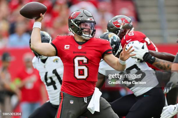 Baker Mayfield of the Tampa Bay Buccaneers throws against the Jacksonville Jaguars during the first quarter of the game against the Jacksonville...