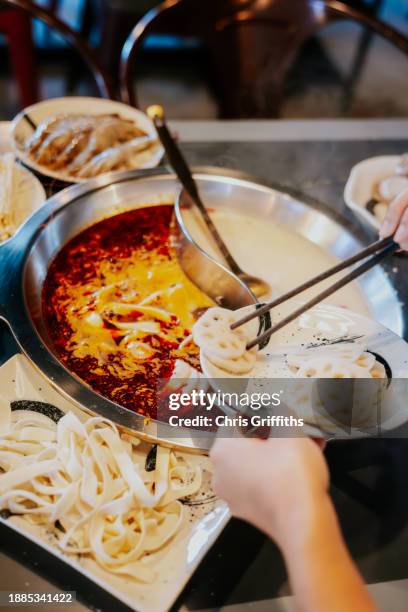 korean style shabu shabu hotpot, bristol, england, united kingdom - soup bowl stock pictures, royalty-free photos & images