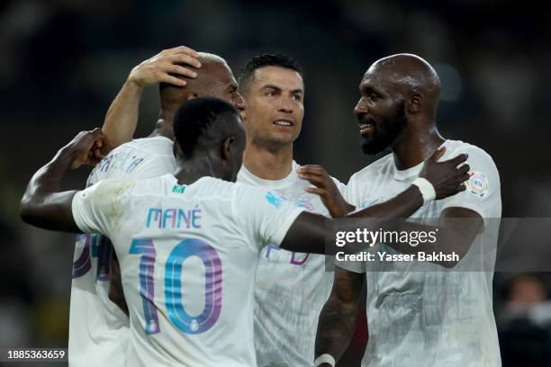 Anderson Talisca of Al Nassr celebrates after scoring their second side goal with Cristiano Ronaldo of Al Nassr during the Saudi Pro League match...