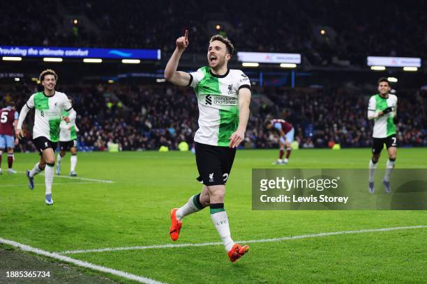 Diogo Jota of Liverpool celebrates after scoring their team's second goal during the Premier League match between Burnley FC and Liverpool FC at Turf...