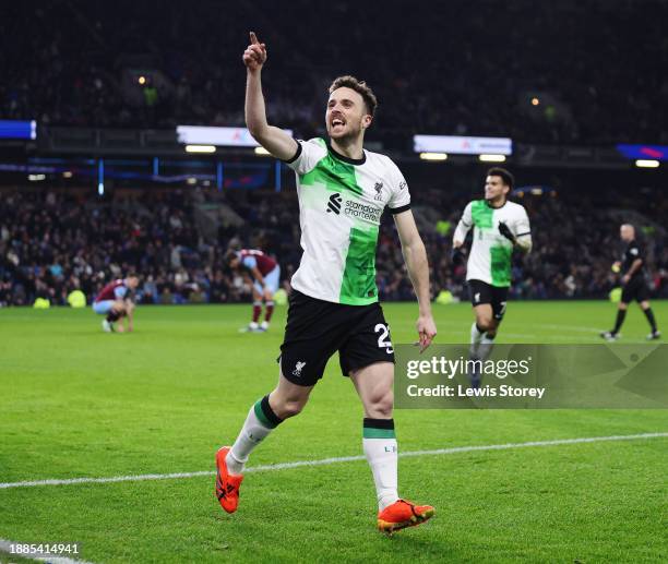 Diogo Jota of Liverpool celebrates after scoring their team's second goal during the Premier League match between Burnley FC and Liverpool FC at Turf...