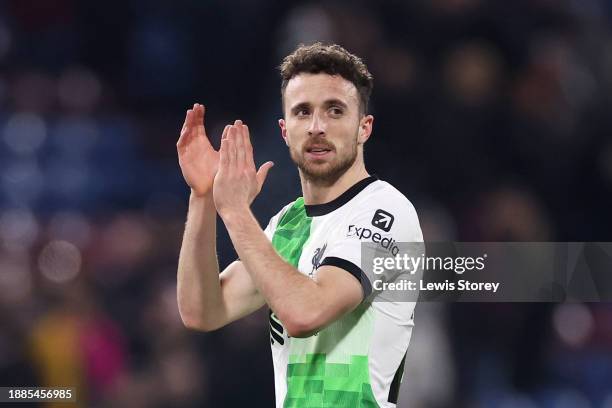 Diogo Jota of Liverpool applauds the fans after the team's victory in the Premier League match between Burnley FC and Liverpool FC at Turf Moor on...