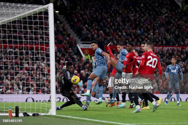 John McGinn of Aston Villa, not in picture, shoots for score their first side goal during the Premier League match between Manchester United and...