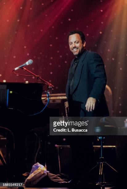 American songwriter and singer Billy Joel performs at Nassau Coliseum in support of his album Storm Front on December 21, 1989 in Uniondale, New York.