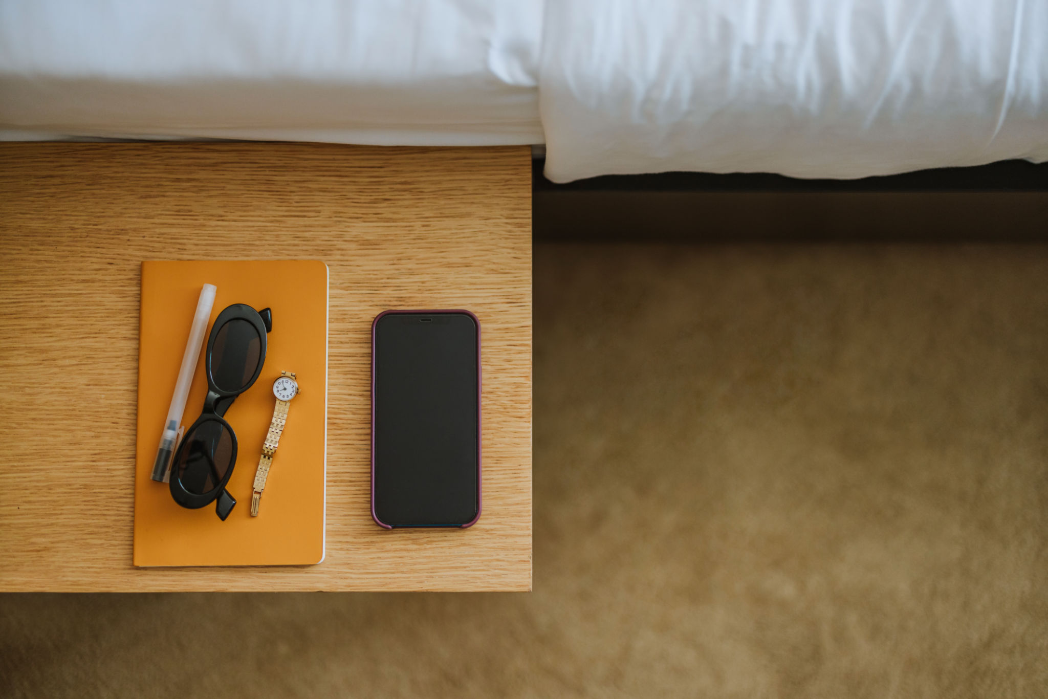 Flat Lay of a Mobile Phone, Sunglasses and a Watch (Copy Space) Flat Lay of a Mobile Phone, Sunglasses and a Watch (Copy Space)