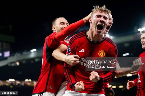 Rasmus Hojlund of Manchester United celebrates with team mates after scoring their sides third goal during the Premier League match between...