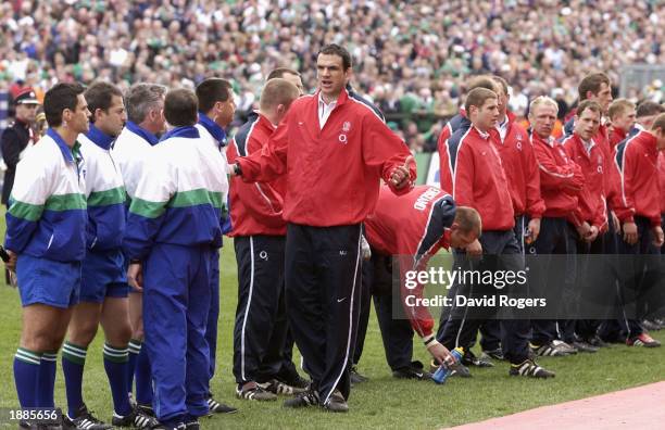 Captain Matrin Johnson of bEngland talks to the referee before kick off during the RBS Six Nations Championship match between Ireland and England at...