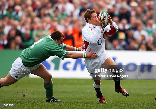 Jonny Wilkinson of England breaks through the Ireland defence during the RBS Six Nations Championship match between Ireland and England at Lansdowne...