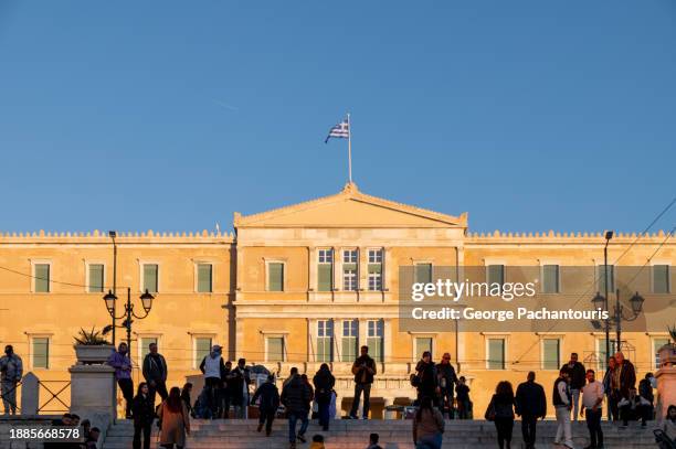 people and the parliament in athens, greece - greece democracy stock pictures, royalty-free photos & images