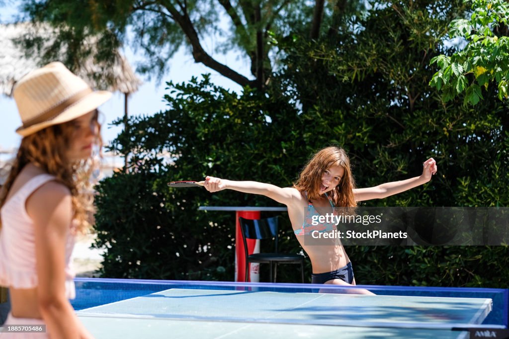 Girls play table tennis