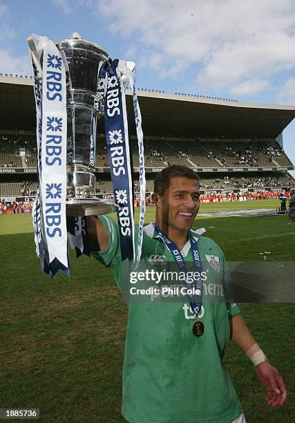 Jason Robinson of England celebrates winning the tournament with the Six Nations Trophy during the RBS Six Nations Championship match between Ireland...