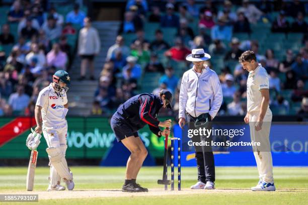 Ground staff attending to the pitch during Day 4 of the Boxing Day Test - Day 4 match between Australia and Pakistan at the Melbourne Cricket Ground...