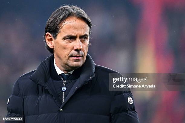 Simone Inzaghi, head coach of Inter, looks on as he enters the pitch prior to kick-off in the Serie A TIM match between Genoa CFC and FC...