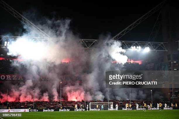 Genoa supporters light flares during the Italian Serie A football match between Genoa and Inter Milan at Luigi Ferraris stadium in Genoa, on December...