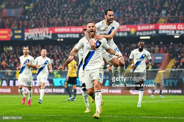 Marko Arnautovic of Inter celebrates with his team-mates after scoring a goal during the Serie A TIM match between Genoa CFC and FC Internazionale at...