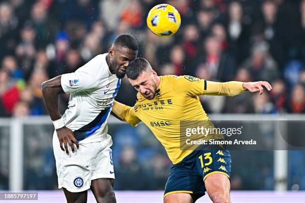 Marcus Thuram of Inter and Mattia Bani of Genoa vie for the ball during the Serie A TIM match between Genoa CFC and FC Internazionale at Stadio Luigi...