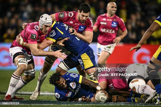 Clermont's Fijian wing Ratu Alivereti Raka is tackled during the French Top14 rugby union match between ASM Clermont Auvergne and Union...