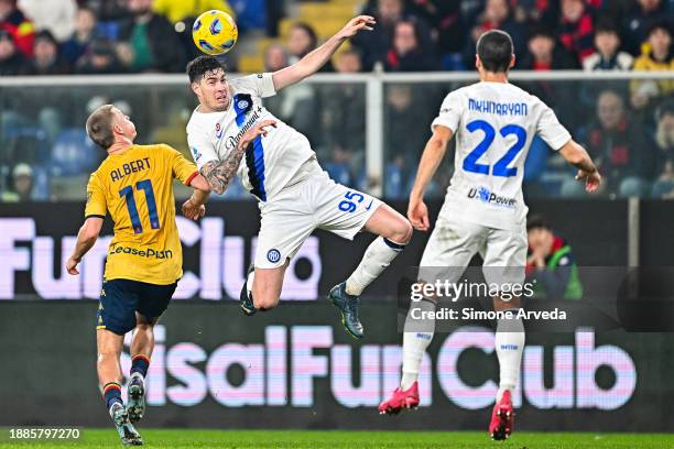 Albert Gudmundsson of Genoa and Alessandro Bastoni of Inter vie for the ball during the Serie A TIM match between Genoa CFC and FC Internazionale at...