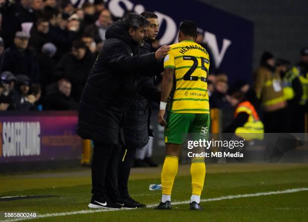 David Wagner, Manager of Norwich City speaking to Onel Hernández of Norwich City during the Sky Bet Championship match between Millwall and Norwich...