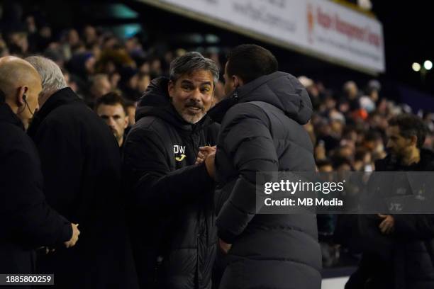 David Wagner, Manager of Norwich City and Joe Edwards, Manager of Millwall shaking hands prior to the Sky Bet Championship match between Millwall and...