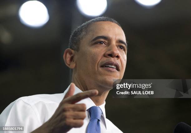 President Barack Obama speaks on the economy and fuel consumption following a tour of the Daimler Trucks North America Manufacturing plant in Mount...