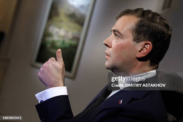 Russian President Dmitry Medvedev gestures during an interview on arrival in Davos to attend the World Economic Forum and to speak at the forum...