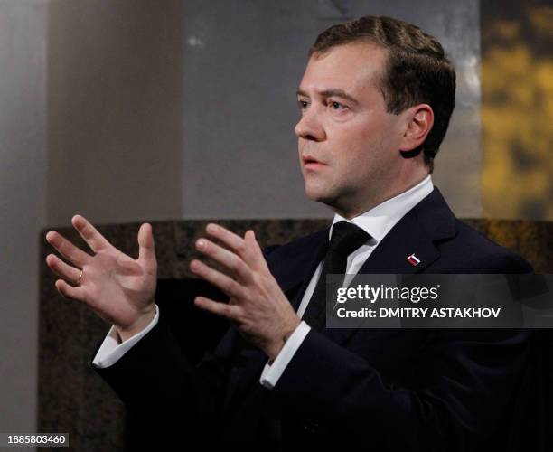 Russian President Dmitry Medvedev gestures during an interview on arrival in Davos to attend the World Economic Forum and to speak at the forum...