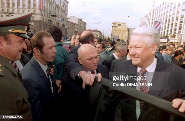 Russian President Boris Yeltsin , Defense minister Pavel Grachov , Interior minister Viktor Yerin and Moscow Mayor Yuri Luzhkov talk on the streets...
