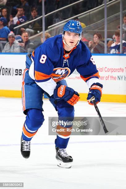 Noah Dobson of the New York Islanders skates during the first period the game against the Washington Capitals on December 29, 2023 at UBS Arena in...