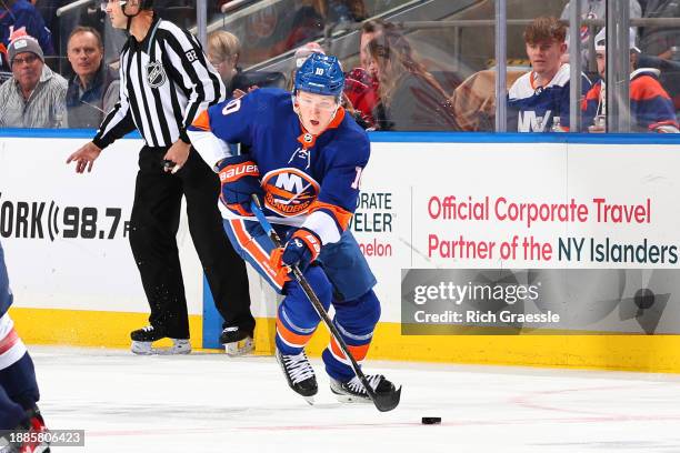 Simon Holmstrom of the New York Islanders skates during the second period of the game against the Washington Capitals on December 29, 2023 at UBS...