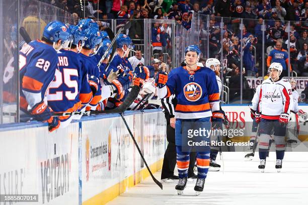 Julien Gauthier of the New York Islanders comes to the bench after scoring his first goal of the game during the third period of the game against the...