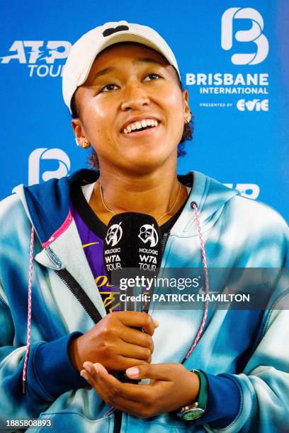 Japan's Naomi Osaka attends a press conference ahead of the Brisbane International tennis tournament in Brisbane on December 30, 2023. / - IMAGE...