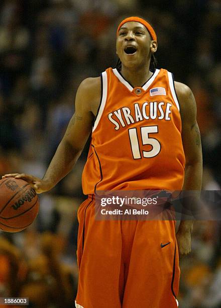 Carmelo Anthony of the Syracuse Orangemen celebrates his team's 63-47 win over the Oklahoma Sooners during the East Regionals of the NCAA...